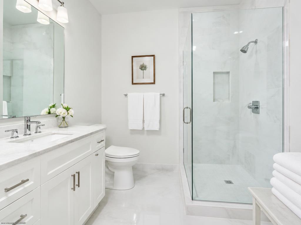 Spotless bathroom with fresh towels